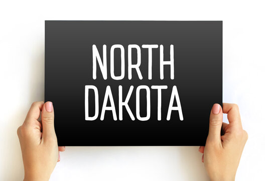 North Dakota is a landlocked U.S. state in the Upper Midwest, text concept on card