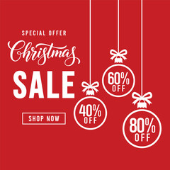 Festive red Christmas sale banner featuring hanging bauble ornaments and bold white typography promoting special offer discounts of 40%, 60%, and 80% off with shop now button, modern holiday promotion