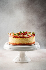 Strawberry cheesecake on elegant white stand