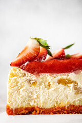 Strawberry cheesecake slice closeup view