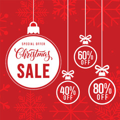 Festive red Christmas sale banner featuring hanging bauble ornaments and bold white typography promoting special offer discounts of 40%, 60%, and 80% off with shop now button, modern holiday promotion