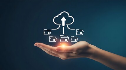 Hand presenting cloud computing network with data folders on a dark background. A person's hands holding a holographic cloud of digital folder and file icons.