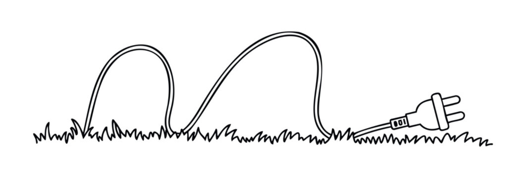 Electric plug disconnected and lying in grass symbolizing unplugged power or disconnection from the grid useful for environmental or technology themes