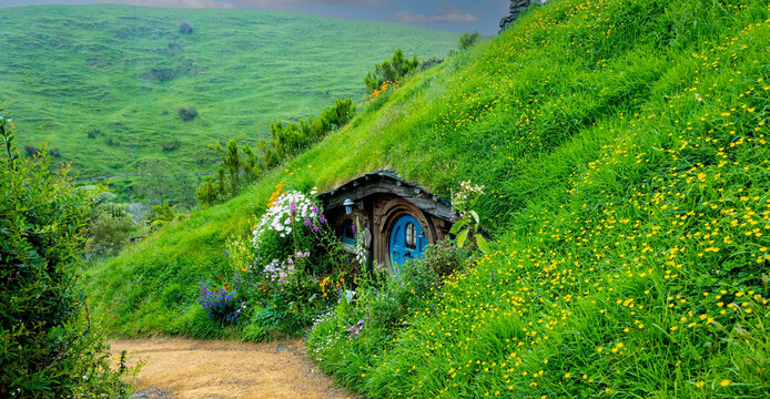 MATAMATA- NEW ZEALAND -NOVEMBER -2- 2022: Hobbiton - movie set created for filming the Lord of the Rings and "Hobbit" movies - Matamata, New Zealand,spring scene