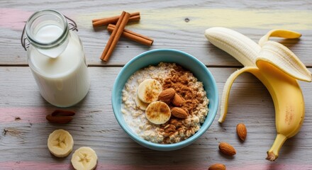 Healthy oatmeal breakfast with banana, cinnamon, and milk