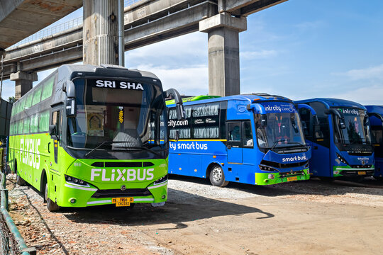 Fleet of electric Flix city bus , parked under a bridge in Bangalore