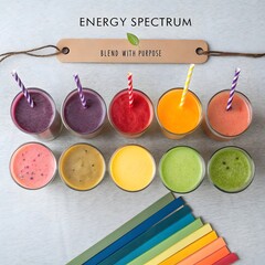 Overhead shot of colorful vegan smoothies aligned by shades