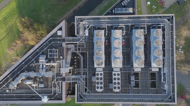 Aerial Top Down View of Cooling Systems on Modern Data Center Roof