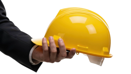 Hand holding yellow hard hat for construction safety