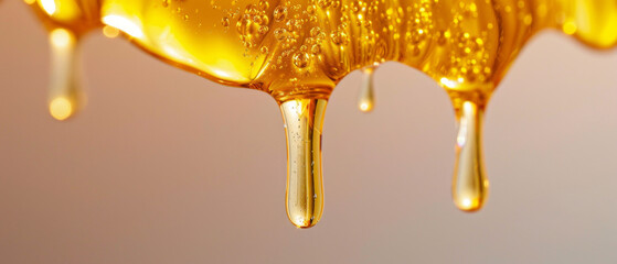 Golden honey dripping from honeycombs will emphasise the naturalness of the product in advertising or serve as an appetising backdrop for culinary blogs.