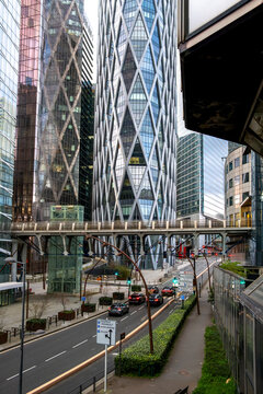 Urban architecture integrating corporate reflection as towering skyscraper forms rise over la defense in paris france supporting the global financial district
