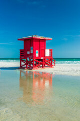 Red lifeguard station tower on Siesta Beach in Siesta Key, Sarasota, Florida