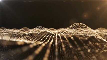 Golden glittering particle waves flowing smoothly for elegant background visuals or luxury brand promotion, adding a touch of magic and sophistication