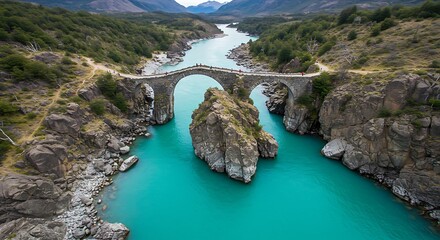 Stunning aerial view of a stone bridge over turquoise river.