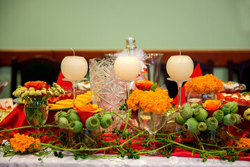 Autumn themed candle and flower table decor