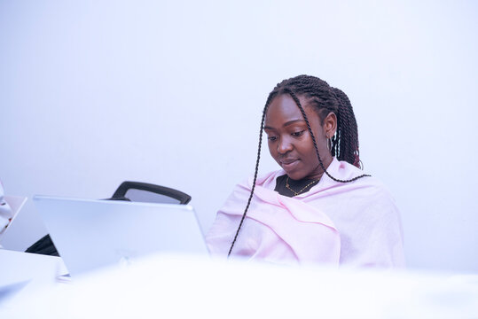 Two african girls interacting during the work time