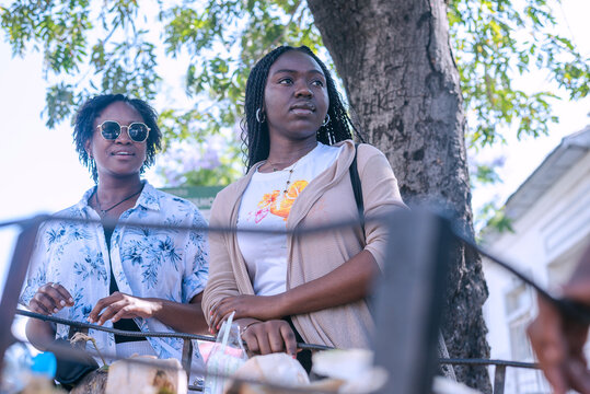 Two beautiful african girls taking a tour in the city