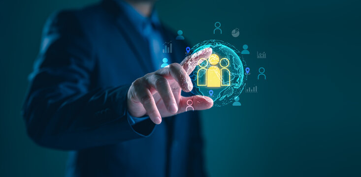 CRM concept with businessman interacting with virtual customer data interface, representing global customer relationship management, digital marketing strategy and client data analytics.