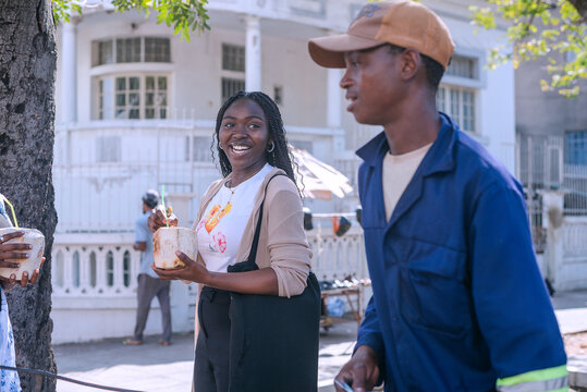Two beautiful african girls taking a tour in the city