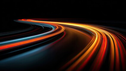 Long exposure shot depicts motion of colored light trails curving against a black background