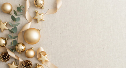 champagne gold ribbon and ornaments on soft neutral background