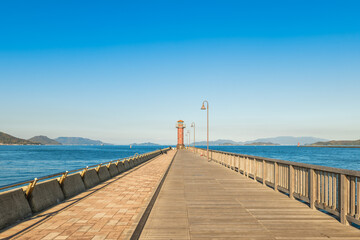 Fototapeta premium Seto Shirube, Takamatsu Port Tamamo Breakwater Lighthouse, in Takamatsu, Kagawa, Japan