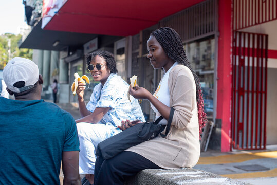 Two beautiful african girls taking a tour in the city