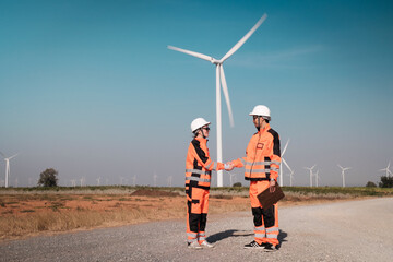 Engineers are inspecting wind turbines to generate electricity.