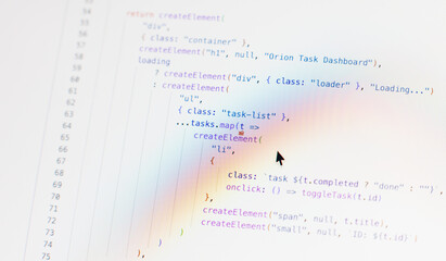 Real-time generated written computer source code in closeup shot on monitor - black letters on white background - concept of digitization, science, research and course of a program script