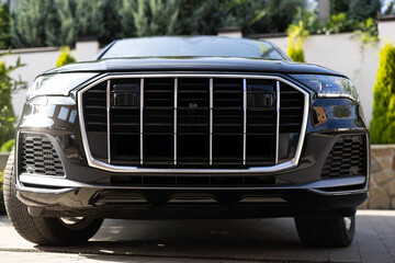 Car grille with adaptive cruise control radar and 360 camera. Lidar for self driving car sensor. Automotive technology concept. ADAS Advanced Driver Assistance System. ACC Adaptive Cruise Control