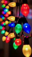 Arrangement of Brightly Lit Holiday Lights Strung Together Colorful Electric Bulbs Against Blurred Setting Seasonal Decorations for Festive Events in Cold Season