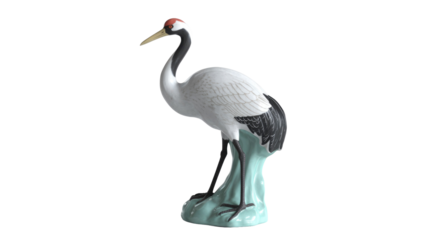 Elegant ceramic red-crowned crane figurine stands gracefully on a teal base, showcasing intricate details of this majestic bird. background removed