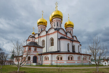 The ancient Cathedral of the Iverskaya Icon of the Mother of God (Assumption Cathedral, 1655-1657) on a cloudy April day. Valdai Iveron Monastery. Novgorod Oblast, Russia