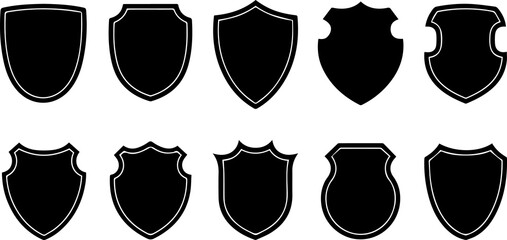 Collection of ten black shield silhouette icons in various traditional and heraldic shapes