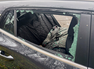 Car window smashed as a result of an act of vandalism