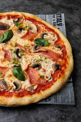 Delicious Fresh Pepperoni Mushroom Basil Pizza On Newspaper For Food Photography