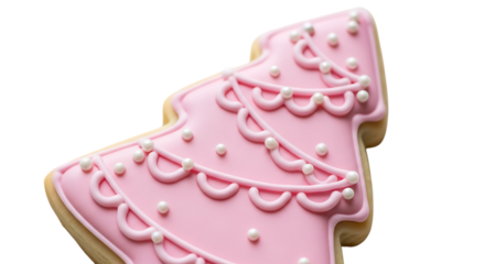 Close up of a festive pink christmas tree sugar cookie decorated with icing and sprinkles
