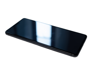 Sleek modern smartphone lying flat on a black surface isolated on transparent background