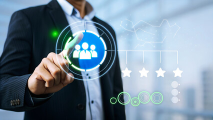 Businessman touching virtual screen with team icon for human resources management and customer relationship management concept