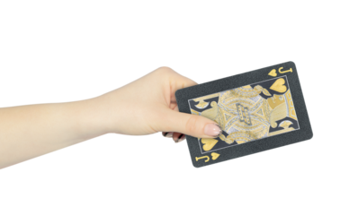 playing card hearts jack in hand, outstretched hand with black playing card isolated from background