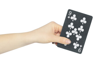 playing card clubs 9 in hand, outstretched hand with black playing card isolated from background