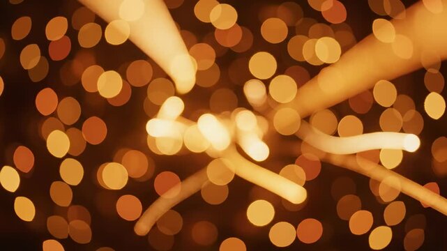 Cinematic abstract background of shifting golden hour bokeh lights dynamically blurring and curving along nonlinear imaginary trajectories smooth, texture, magic