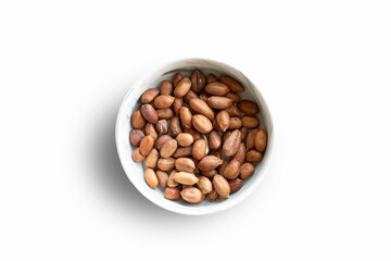 Roasted peanuts in a bowl on a white background stock photo