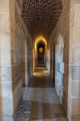 Fototapeta premium The Citadel of Qaitbay or the Fort of Qaitbay is a 15th-century defensive fortress located on the Mediterranean sea coast. Ordinary people walk nearby. inside the castle. Inetriers