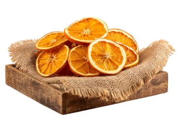 Pile of dried orange slices on a burlap cloth isolated on transparent background