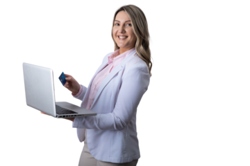 Woman holding laptop and credit card shopping online