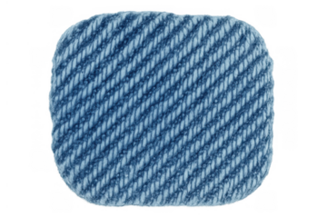 Blue denim fabric texture close-up with diagonal weave pattern on transparent background for design and textile projects