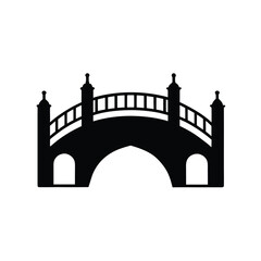 Silhouette of ornate bridge structure spanning gap with architectural design style