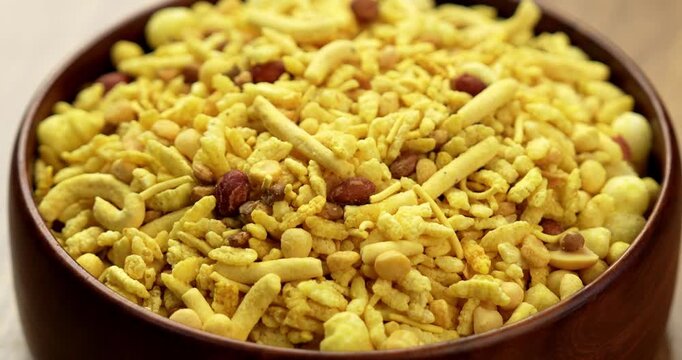 Bombay mix or Chanachur or Chiwda or farsan also known as khatta meetha chivda is an Indian snack mix, popular tea-time food from India