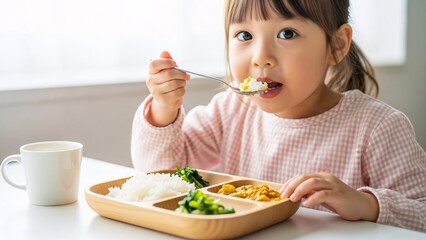 Toddler Enjoying Balanced Meal at Table, showcasing healthy eating habits and focus on child nutrition for young development